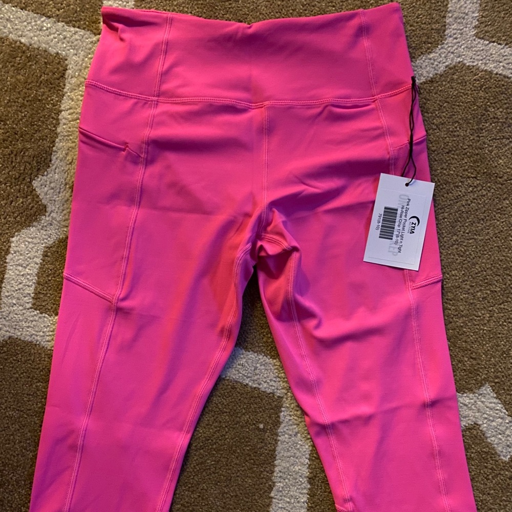 Zyia pink light n tight zipper pockets